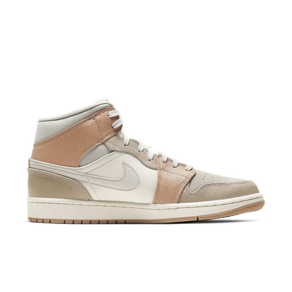 Nike Air Jordan 1 Mid Milan sneakers featuring a blend of beige and white colors, inspired by Milan's architectural style.