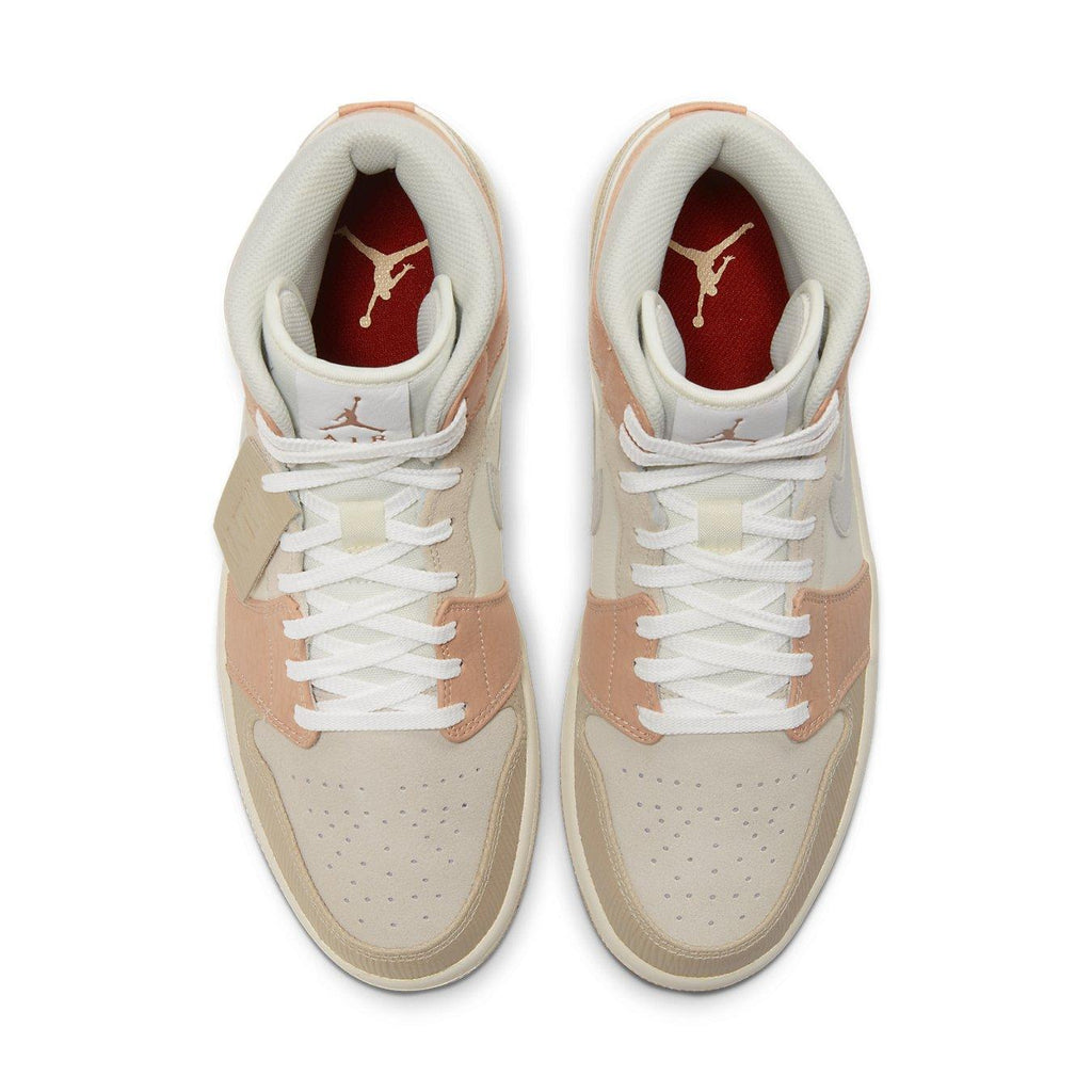 Air Jordan 1 Mid Milan shoes in cream and peach tones, showcasing vintage style and architectural inspiration.