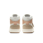 Rear view of Jordan 1 Mid Milan sneakers showcasing vintage-inspired design and architectural details.