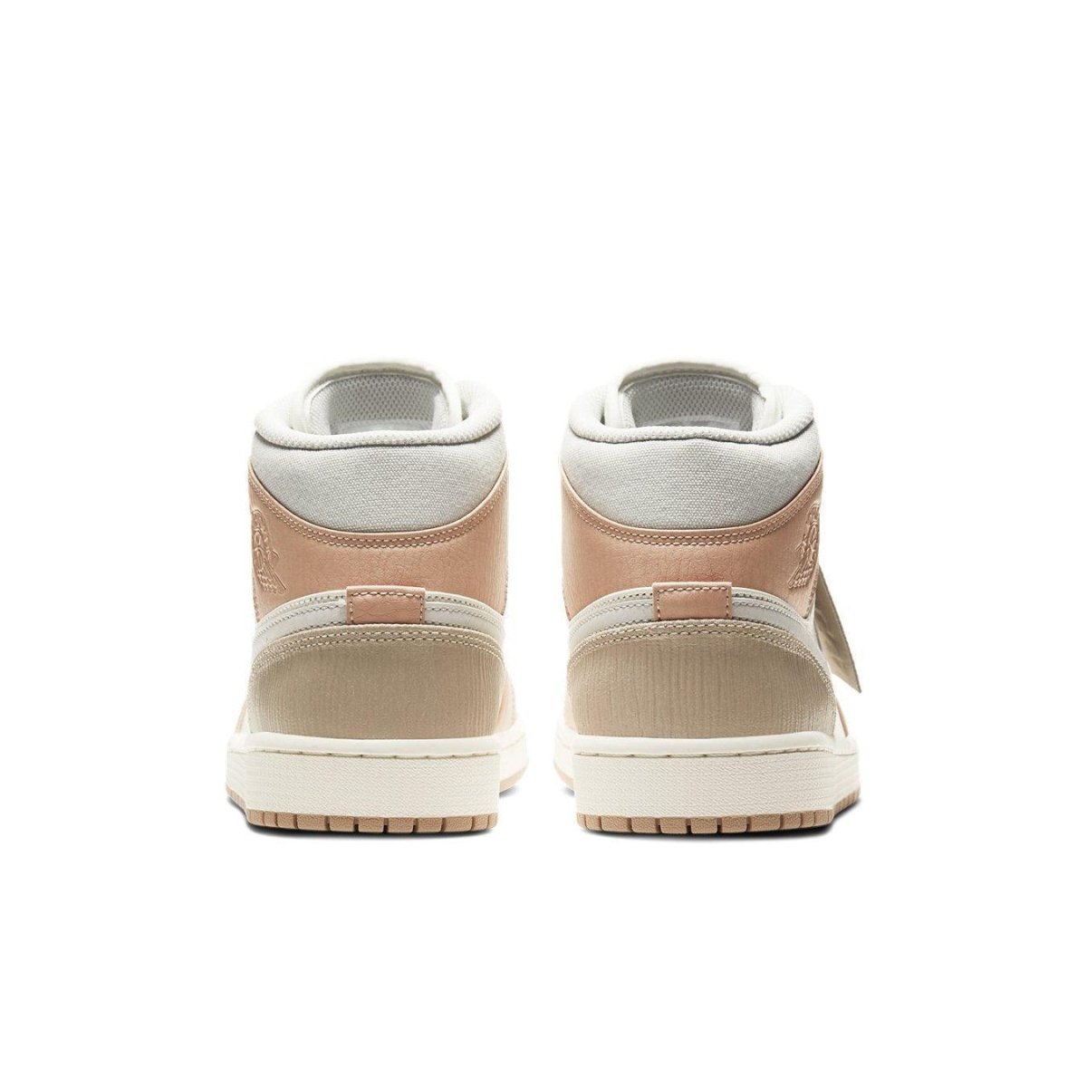 Rear view of Jordan 1 Mid Milan sneakers showcasing vintage-inspired design and architectural details.