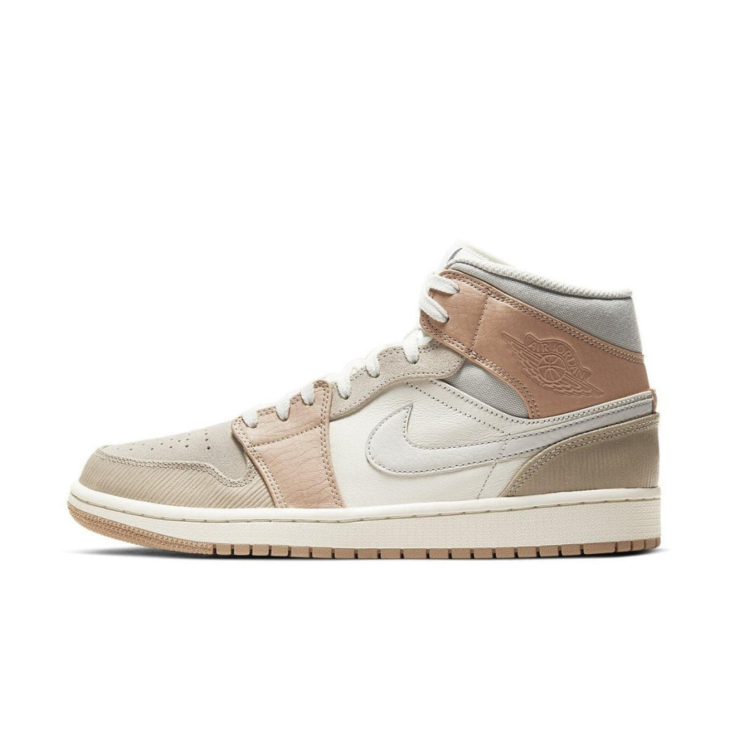 Air Jordan 1 Mid Milan sneaker featuring a beige and light cream colorway, inspired by Milan's architectural beauty.