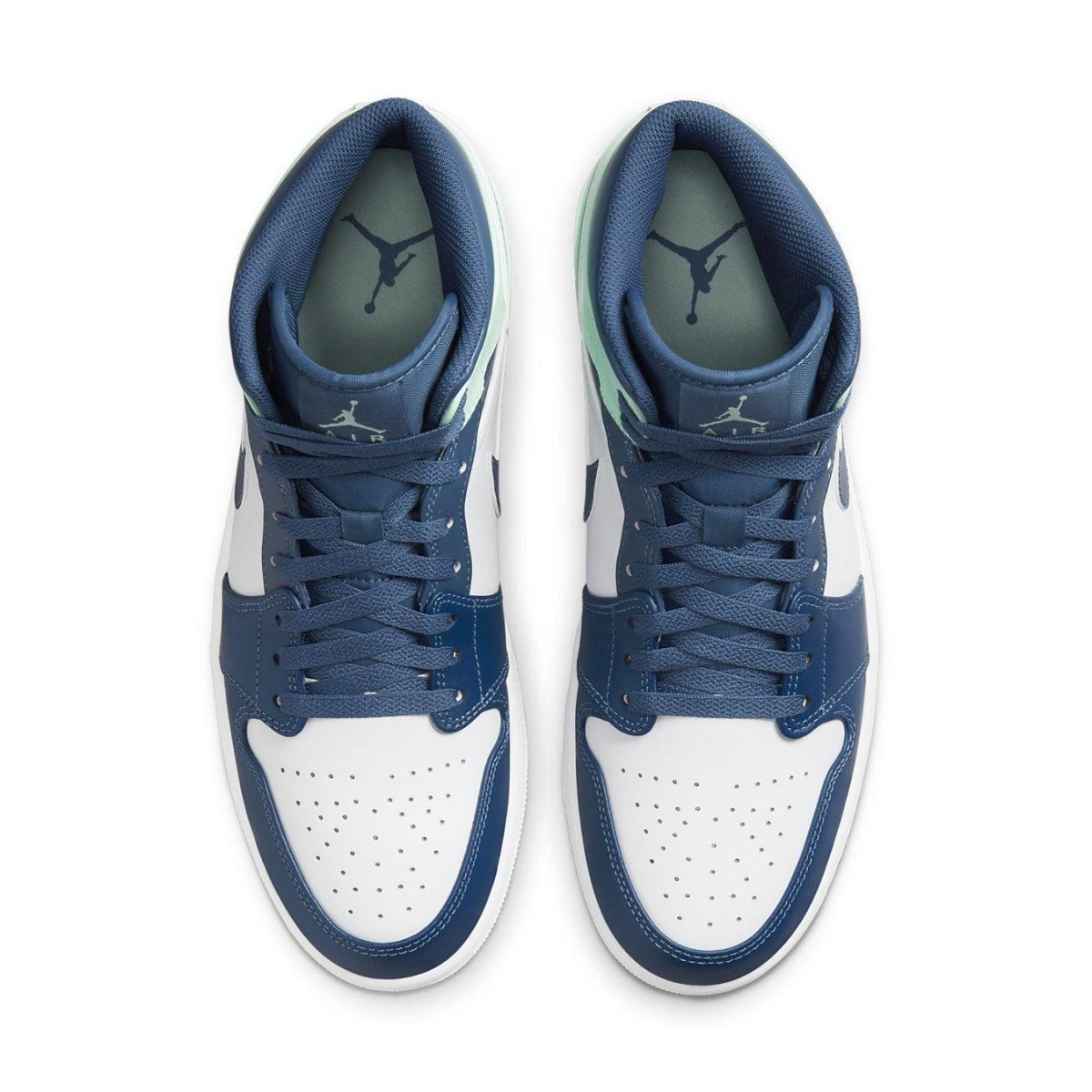 Air Jordan 1 Mid Mystic Navy Mint Foam sneakers with navy and white leather design and mint accents.