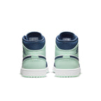 Air Jordan 1 Mid Mystic Navy Mint Foam shoes with mint and navy colorway, featuring logo and cushioned collar.