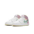 Jordan 1 Mid Paint Drip (GS) shoes in white with pink and mint drip paint details on the upper and sole.