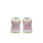 Air Jordan 1 Mid Paint Drip (GS) with pink and mint paint drip details, showcasing textured leather and white midsole.