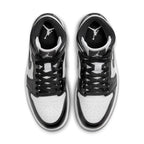 Top view of women's Jordan 1 Mid Panda sneakers featuring a black and white colorway and iconic Jordan logo.