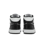 Back view of the women's Jordan 1 Mid Panda sneakers in black and white leather.