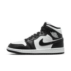 Air Jordan 1 Mid Panda Women's sneaker in black and white leather with iconic Swoosh and logo.