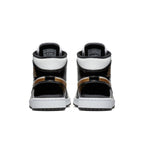 Back view of Nike Jordan 1 Mid Patent Black White Gold sneakers showcasing unique colorway and patent leather.