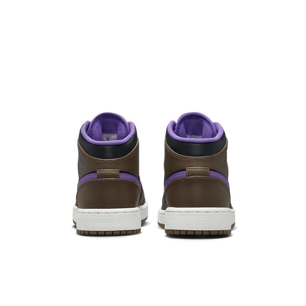 Rear view of Jordan 1 Mid Purple Mocha GS sneakers showcasing brown leather and purple accents.