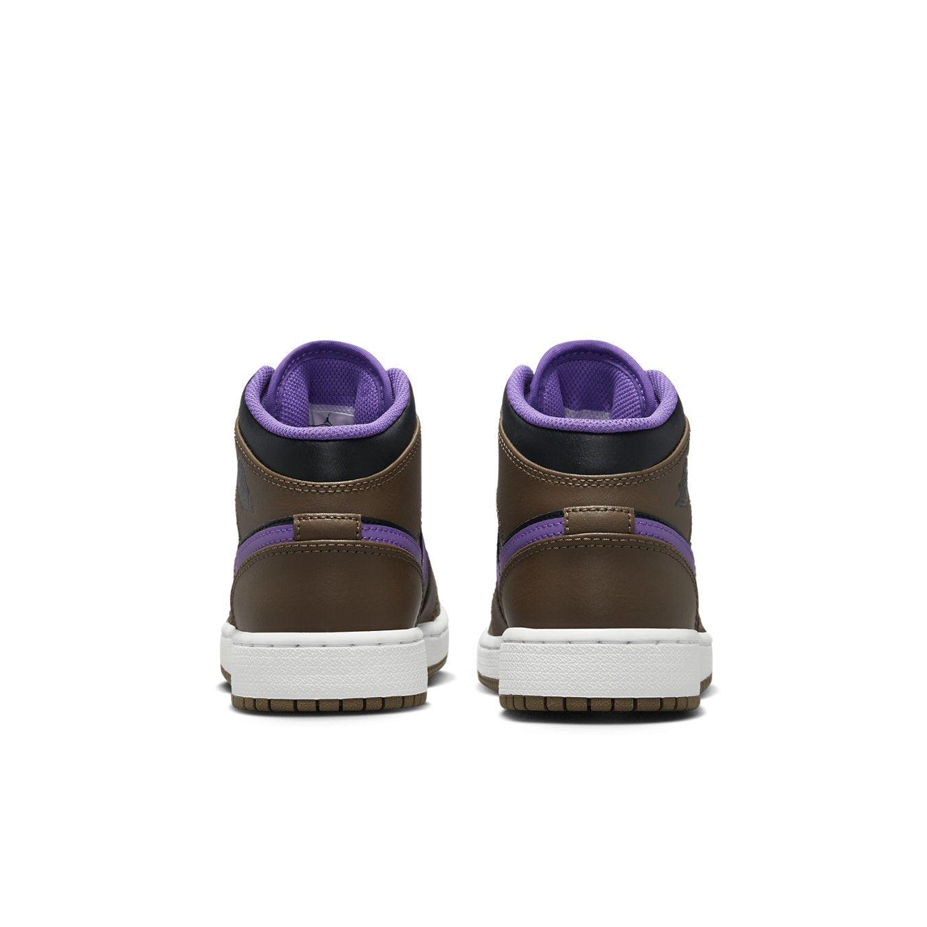 Rear view of Jordan 1 Mid Purple Mocha GS sneakers showcasing brown leather and purple accents.