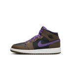 Air Jordan 1 Mid Purple Mocha GS sneaker featuring brown and purple leather, iconic Swoosh, and perforated toe for breathability.