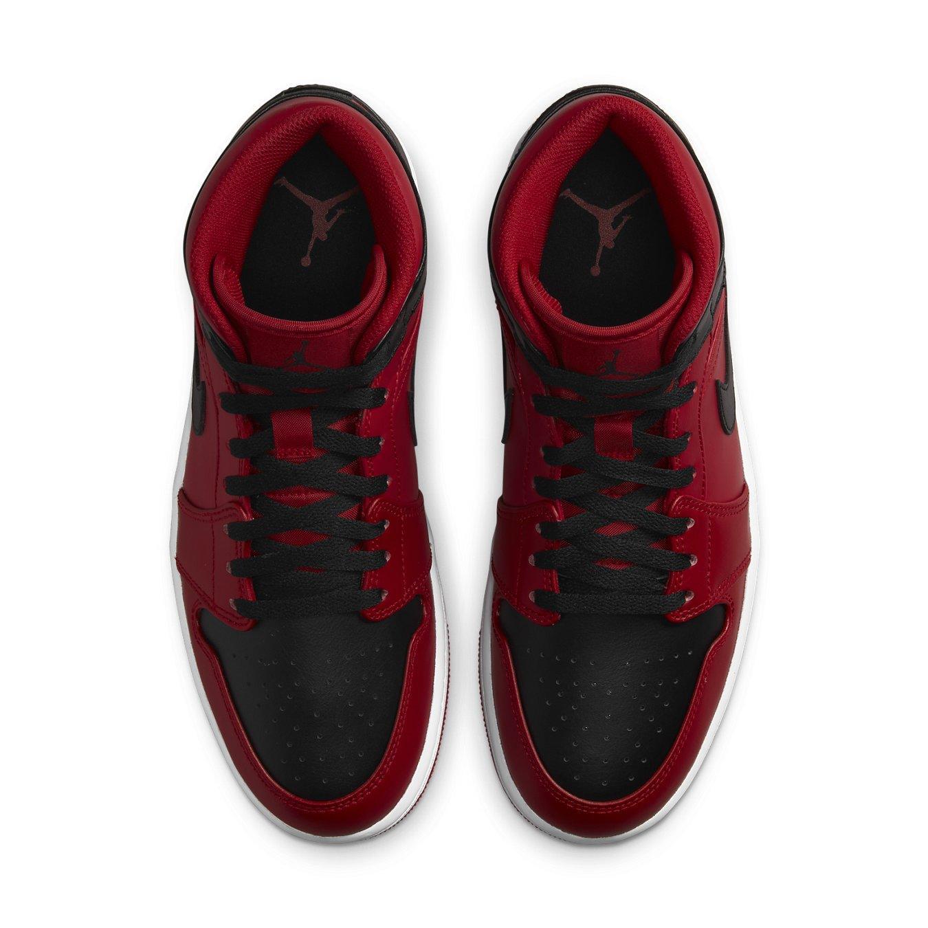 Air Jordan 1 Mid Reverse Bred 2021 sneakers in black and red colorway, featuring a classic design with modern updates.