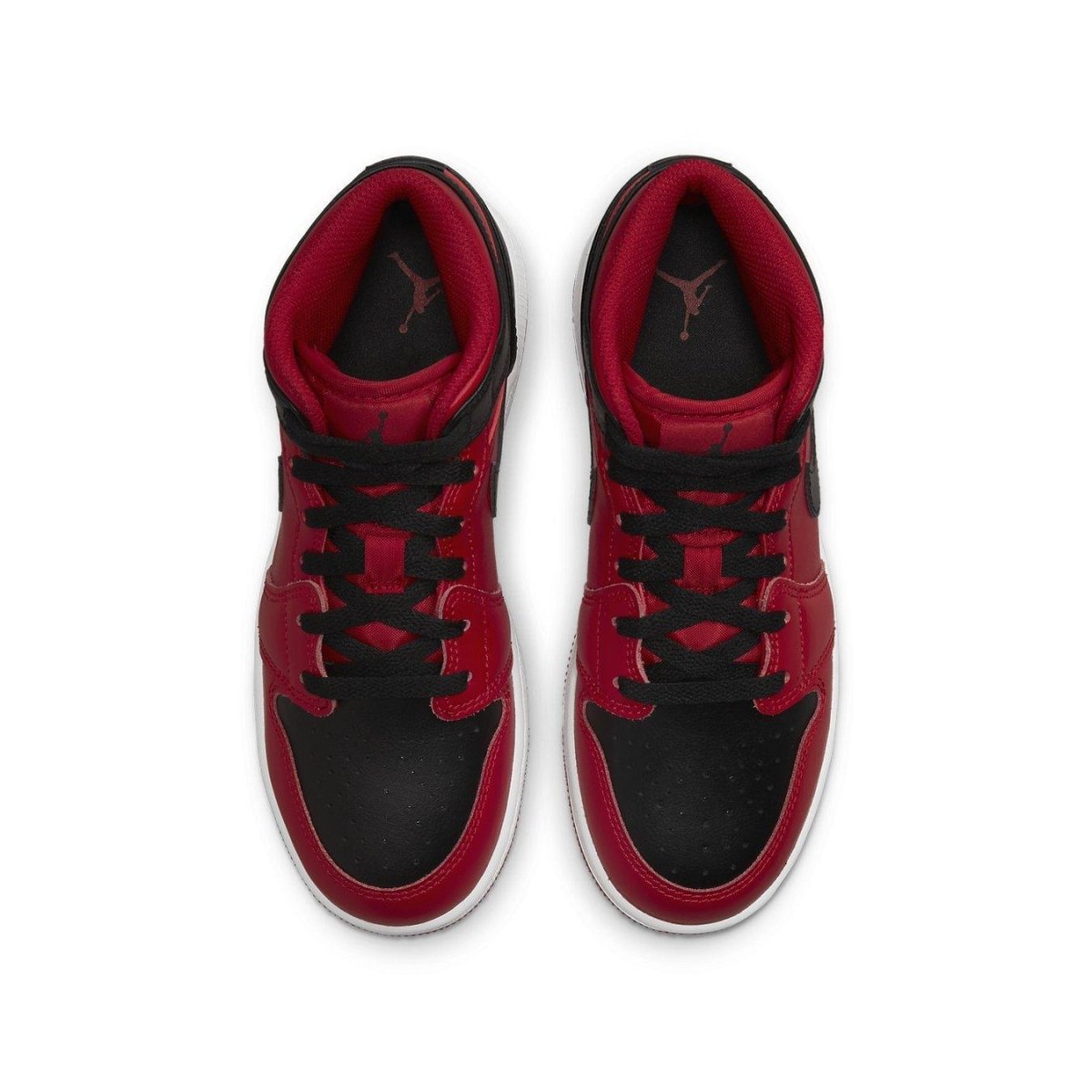 Jordan 1 Mid Reverse Bred (2021) GS sneakers, featuring red and black colorway, top view, stylish athletic footwear.