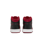 Back view of Jordan 1 Mid Reverse Bred (2021) GS sneakers featuring black and red color scheme.