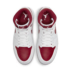 Top view of Jordan 1 Mid Reverse Chicago (W) sneakers in white and red colorway, featuring iconic design elements.