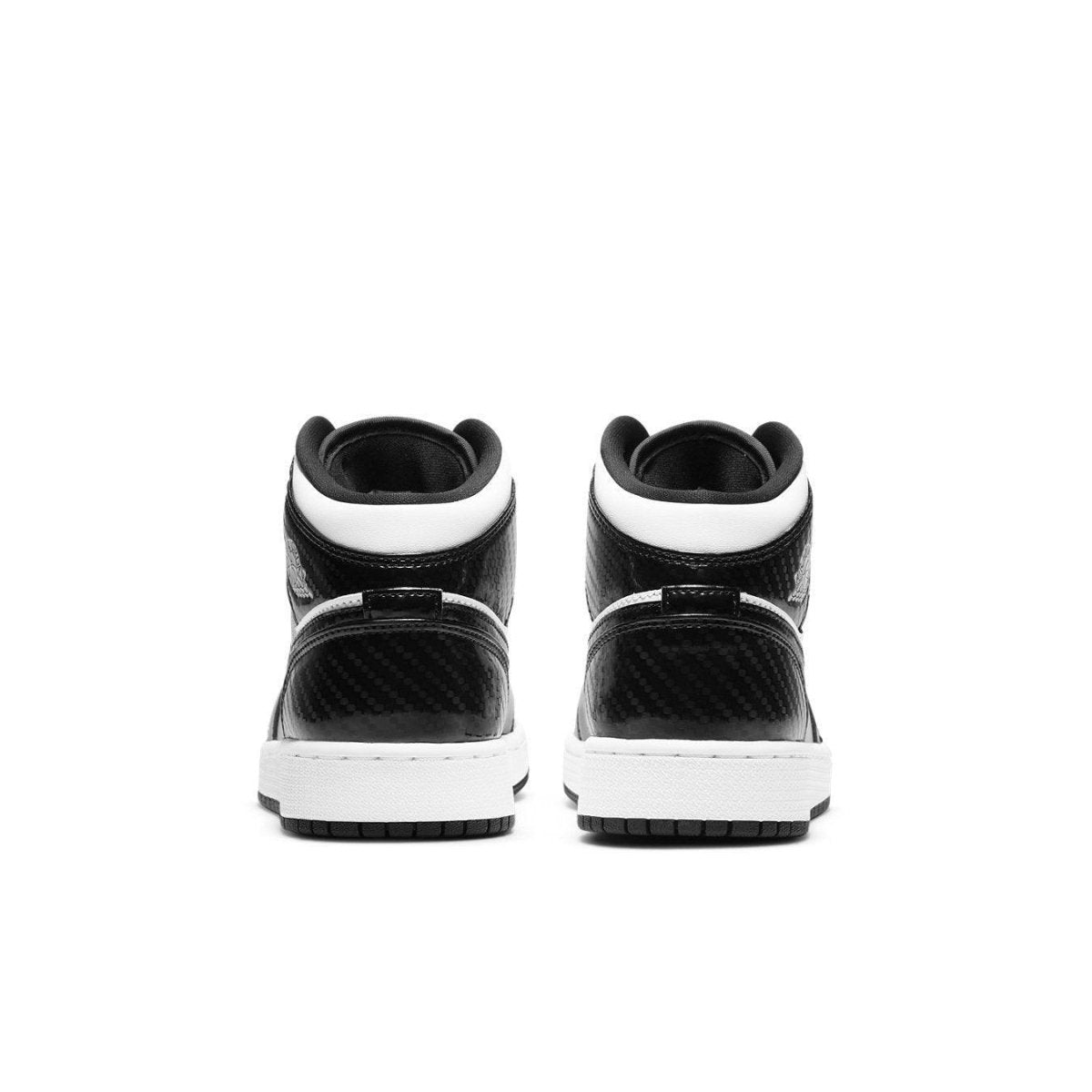 Rear view of Jordan 1 Mid SE All-Star Carbon Fiber (2021) GS with black and white color scheme.