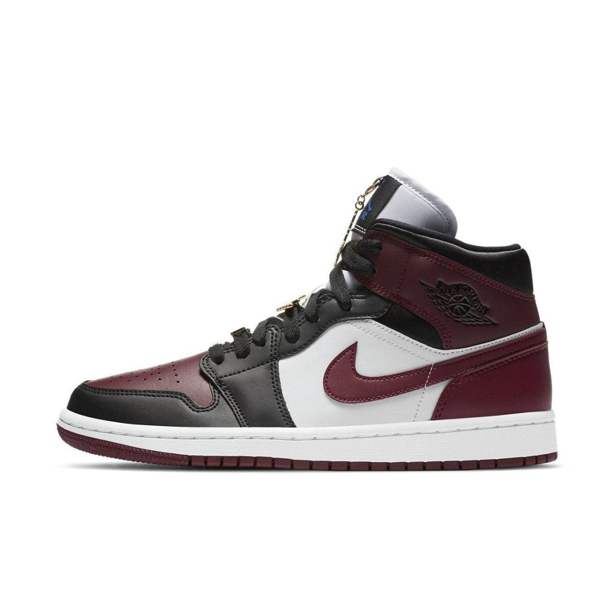 Jordan 1 Mid SE Black Dark Beetroot women's sneakers featuring gold accents and classic silhouette.