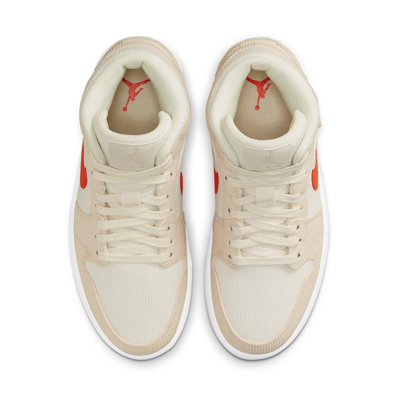 Top view of Air Jordan 1 Mid SE Corduroy Sail featuring corduroy upper in cream and peach with bright orange Swoosh.