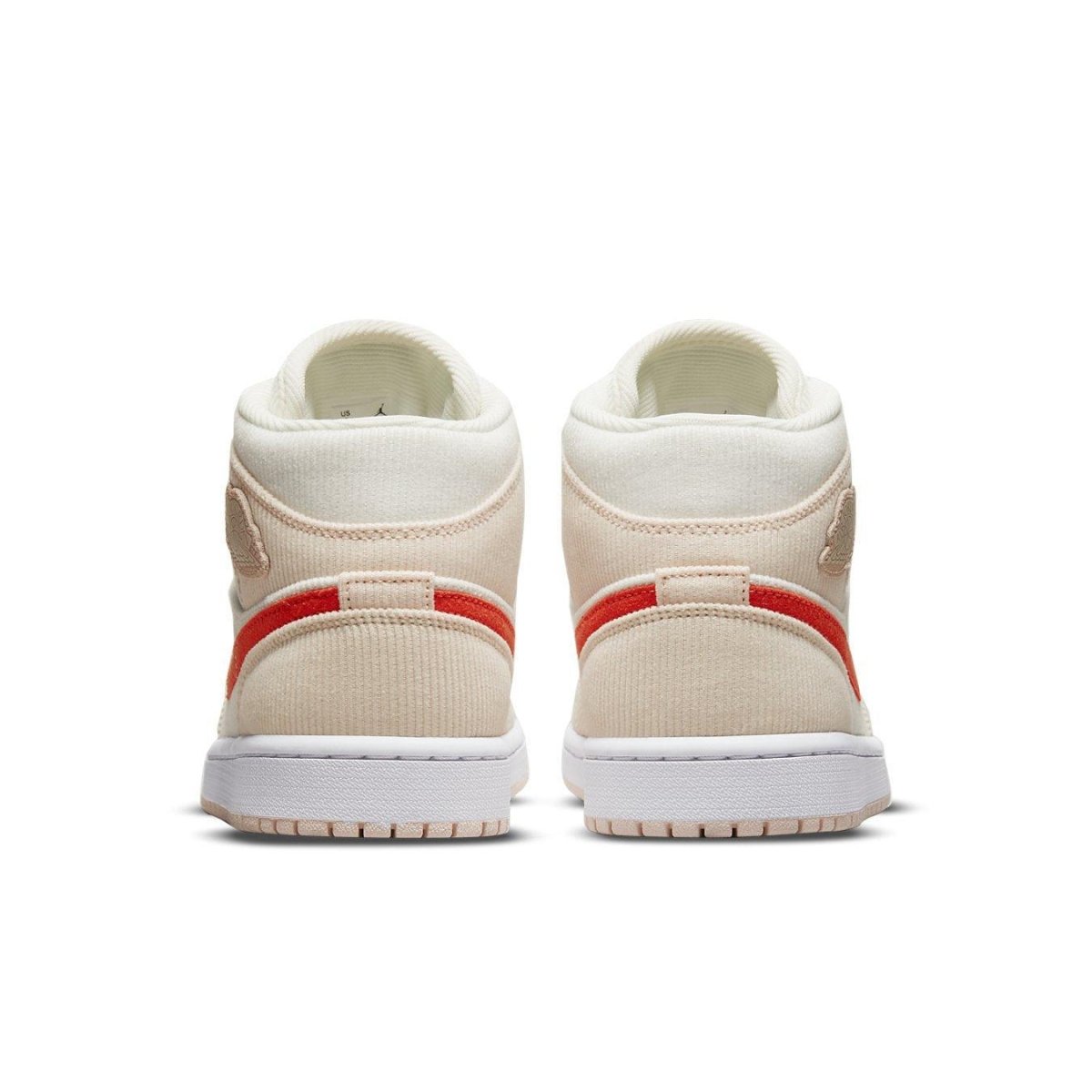 Back view of Air Jordan 1 Mid SE Corduroy Sail sneakers featuring corduroy upper and vibrant orange accents.