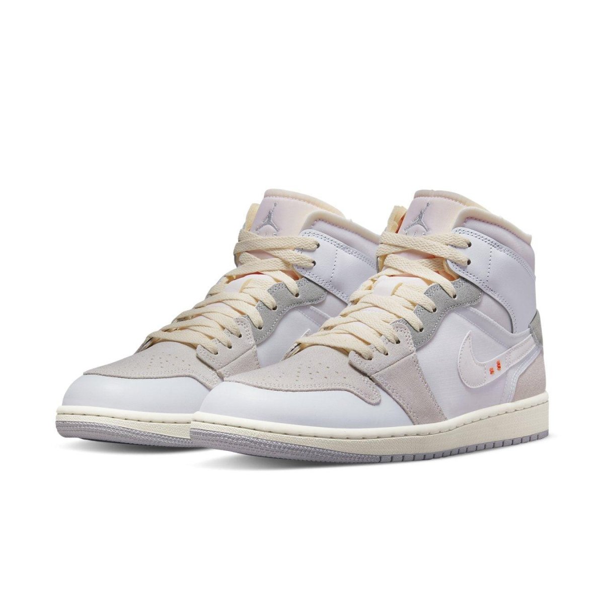 Jordan 1 Mid SE Craft Inside Out in white and grey with layered panels and playful detailing.