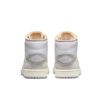 Jordan 1 Mid SE Craft Inside Out in white, grey, showcasing the back view with iconic branding and layered design.