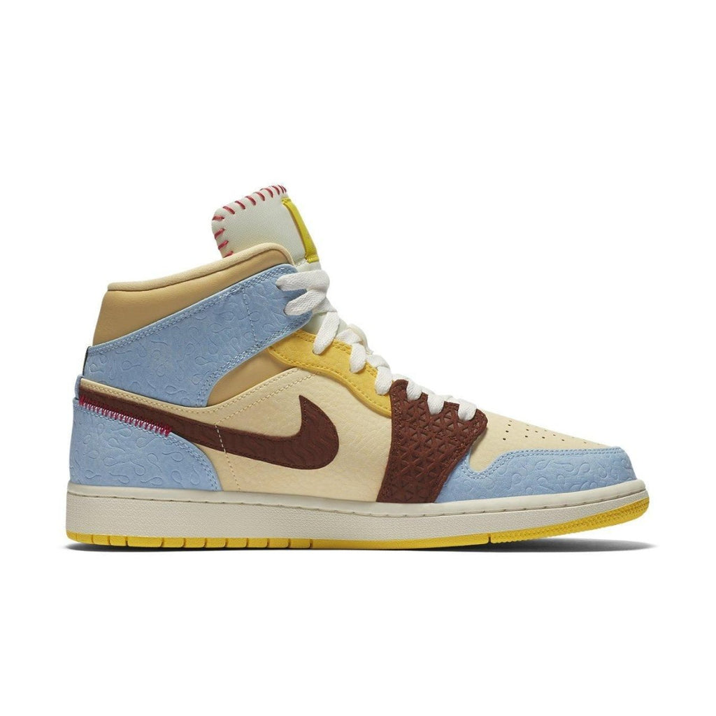 Jordan 1 Mid SE Fearless Maison Chateau Rouge sneaker with unique colors and patterns inspired by African heritage.
