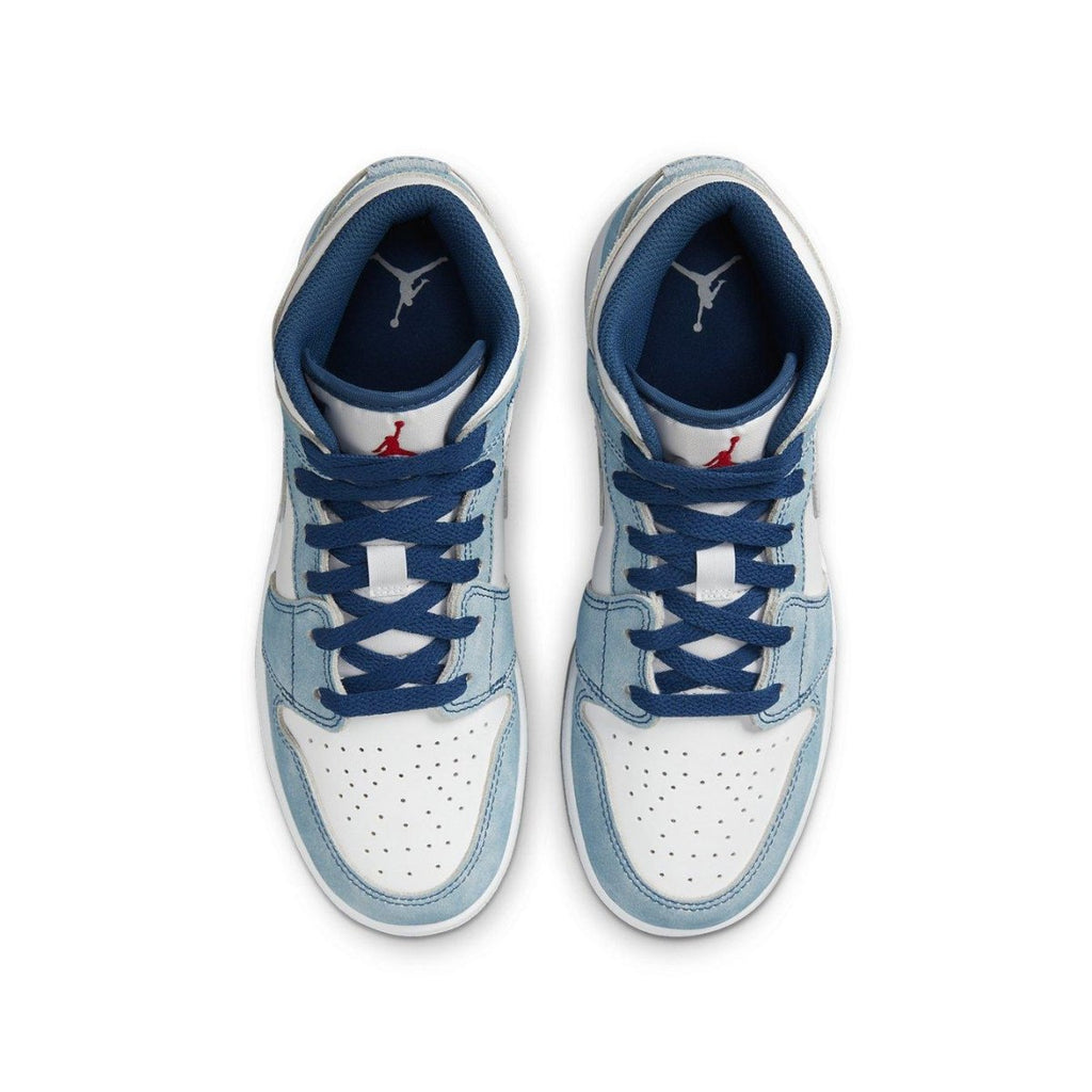 Air Jordan 1 Mid SE GS shoes in French Blue and white, showcasing suede and leather upper with blue laces and Jumpman logo.