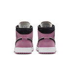 Back view of Air Jordan 1 Mid SE Light Mulberry sneakers in Berry Pink with black accents and white sole.