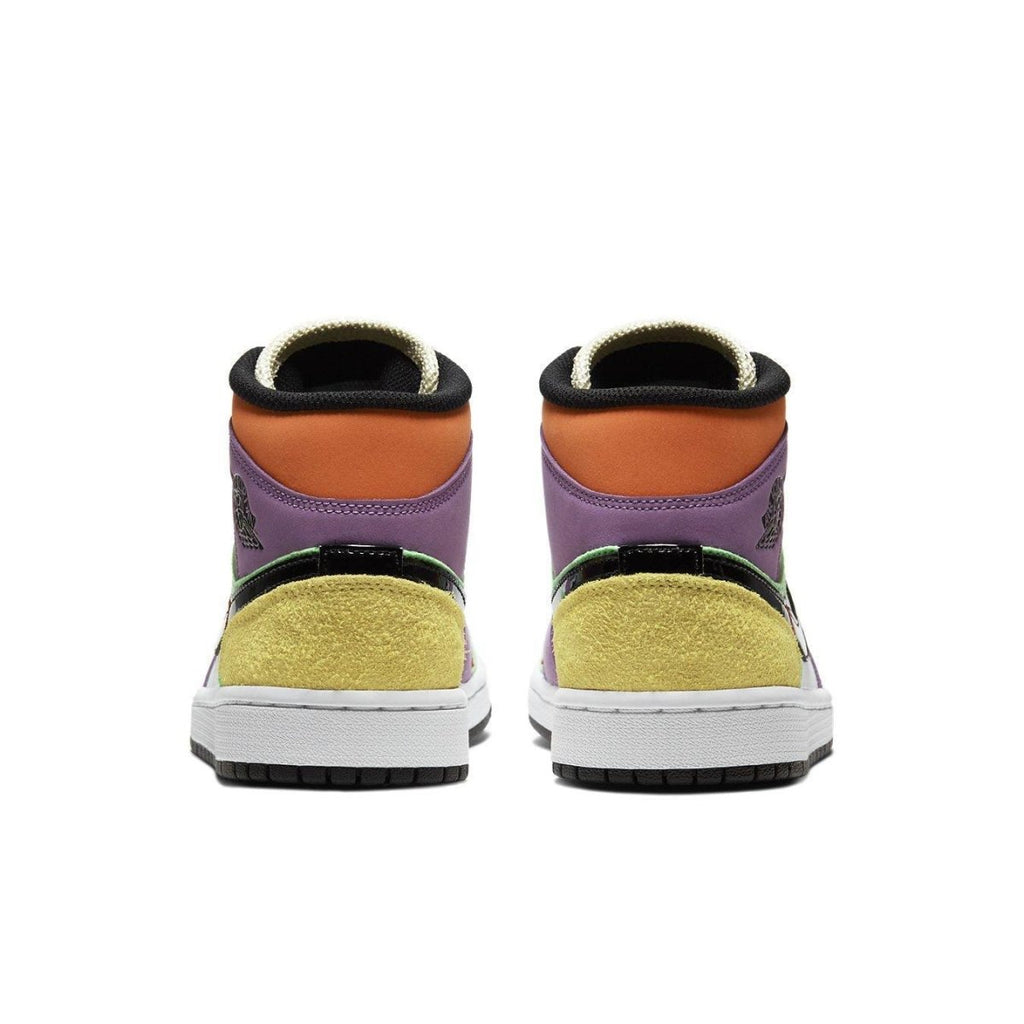 Rear view of women's Air Jordan 1 Mid SE Multi-Color featuring green, yellow, and purple design elements.