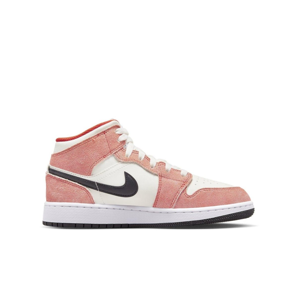 Jordan 1 Mid SE in orange suede and white leather, featuring black Swoosh and stylish high-top design.
