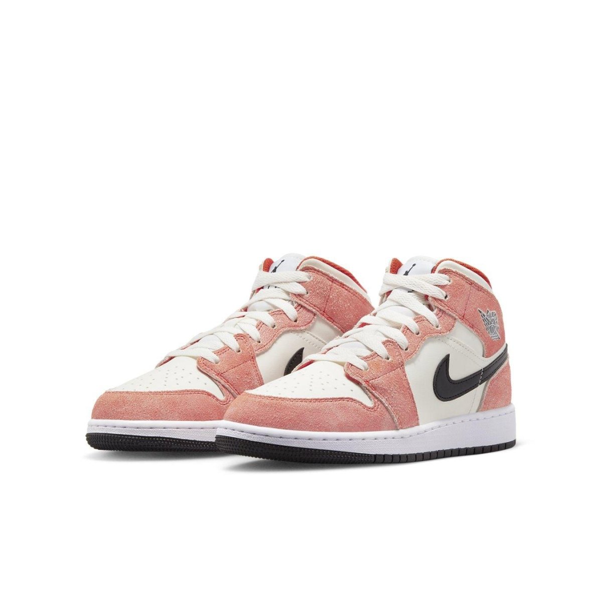 Jordan 1 Mid SE in pink suede and white leather, featuring black Swoosh and rubber outsole.