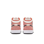 Back view of Jordan 1 Mid SE Orange Suede sneakers featuring orange suede and black details.