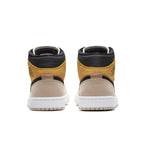 Back view of the Jordan 1 Mid SE Particle Beige women's sneakers with stylish color blocking.
