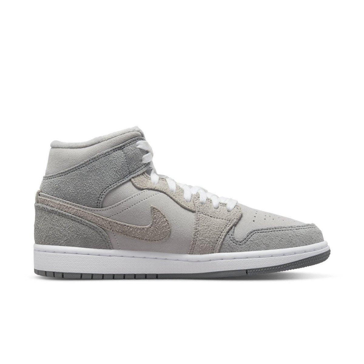 Nike Air Jordan 1 Mid SE Particle Grey women's sneaker featuring suede and synthetic leather.