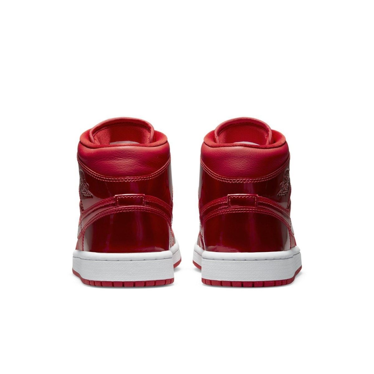 Jordan 1 Mid SE Pomegranate women's shoes featuring a vibrant glossy red finish, perfect for the holiday season.