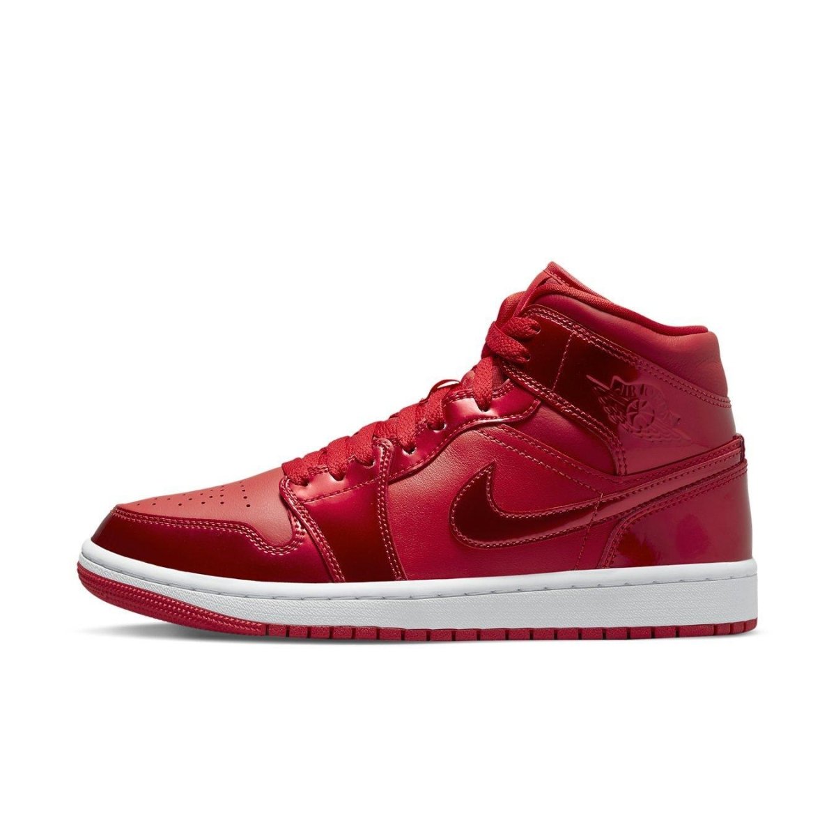 Jordan 1 Mid SE Pomegranate in bright red leather, perfect for festive occasions, with a white sole and classic design.