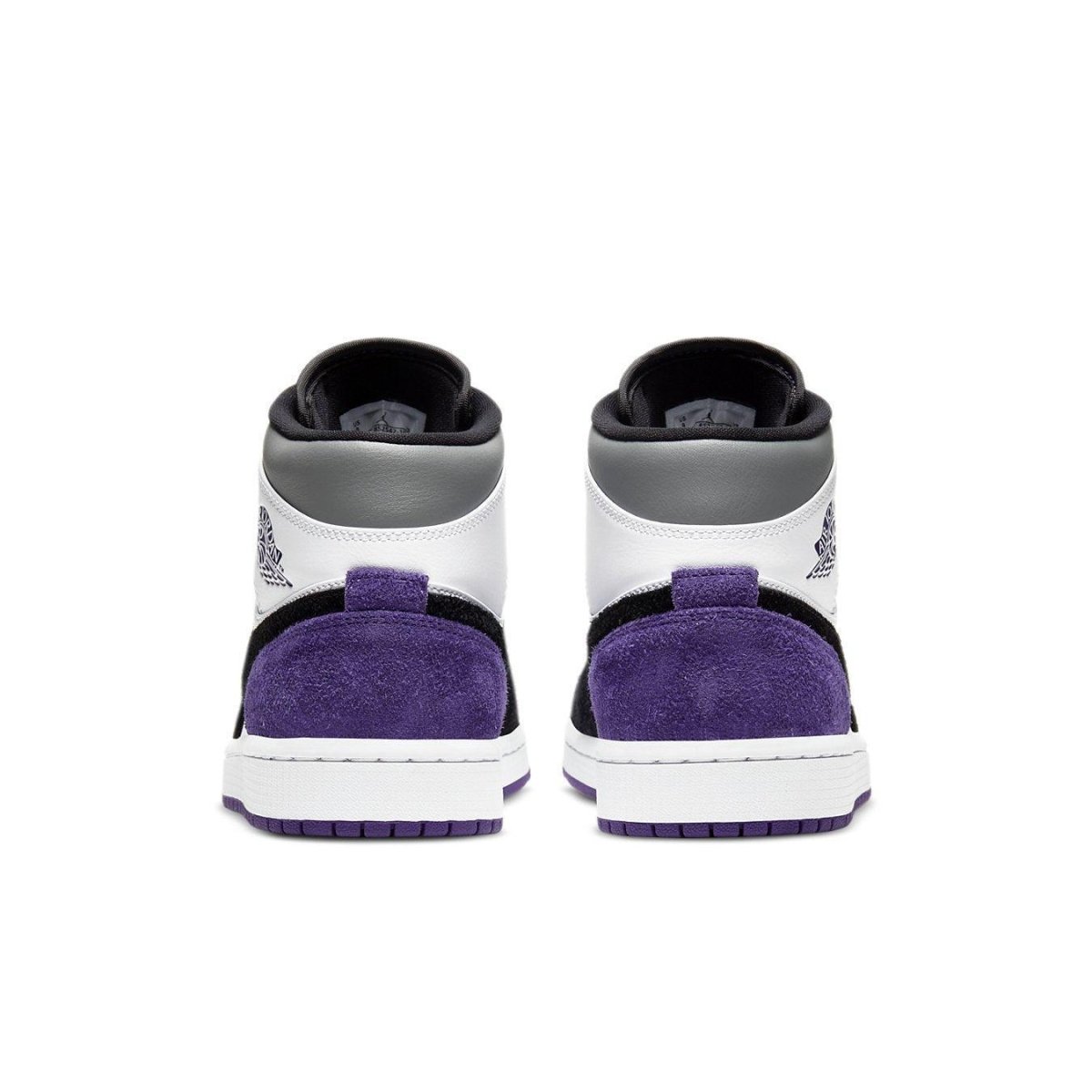 Back view of Jordan 1 Mid SE Purple sneakers showcasing suede and mesh design.