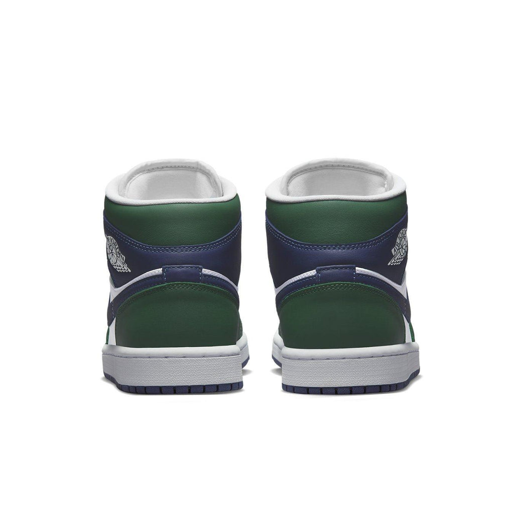 Rear view of Jordan 1 Mid SE Seahawks women's sneakers in green and navy blue.