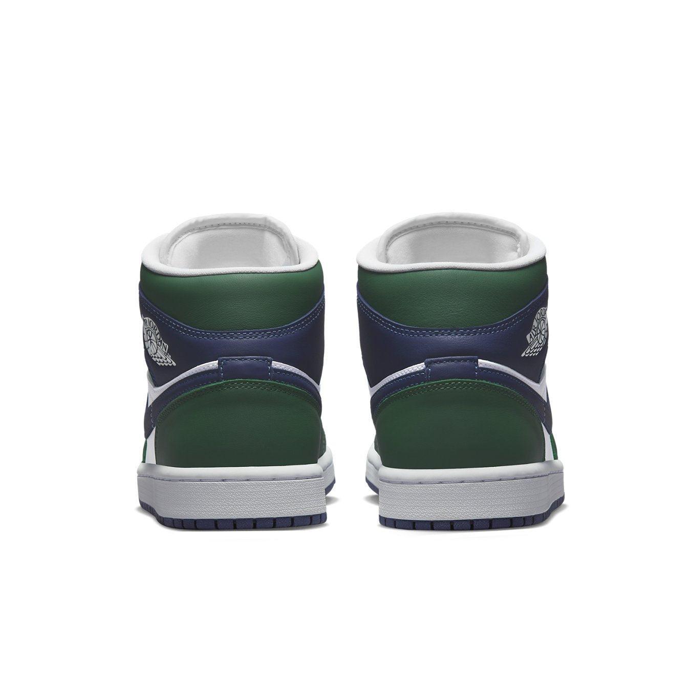 Rear view of Jordan 1 Mid SE Seahawks women's sneakers in green and navy blue.