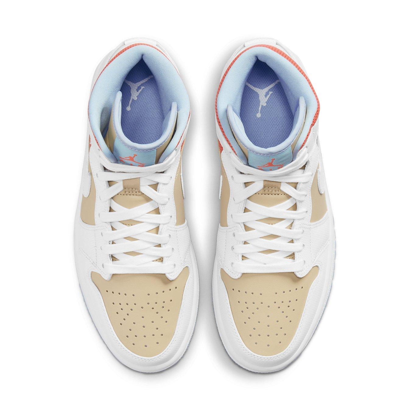 Jordan 1 Mid SE Sesame (W) sneakers in premium leather with micro-perforated overlays and iconic Swoosh logo.