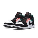 Jordan 1 Mid SE South Beach sneakers with white, black, pink, and turquoise colorway on a white sole.