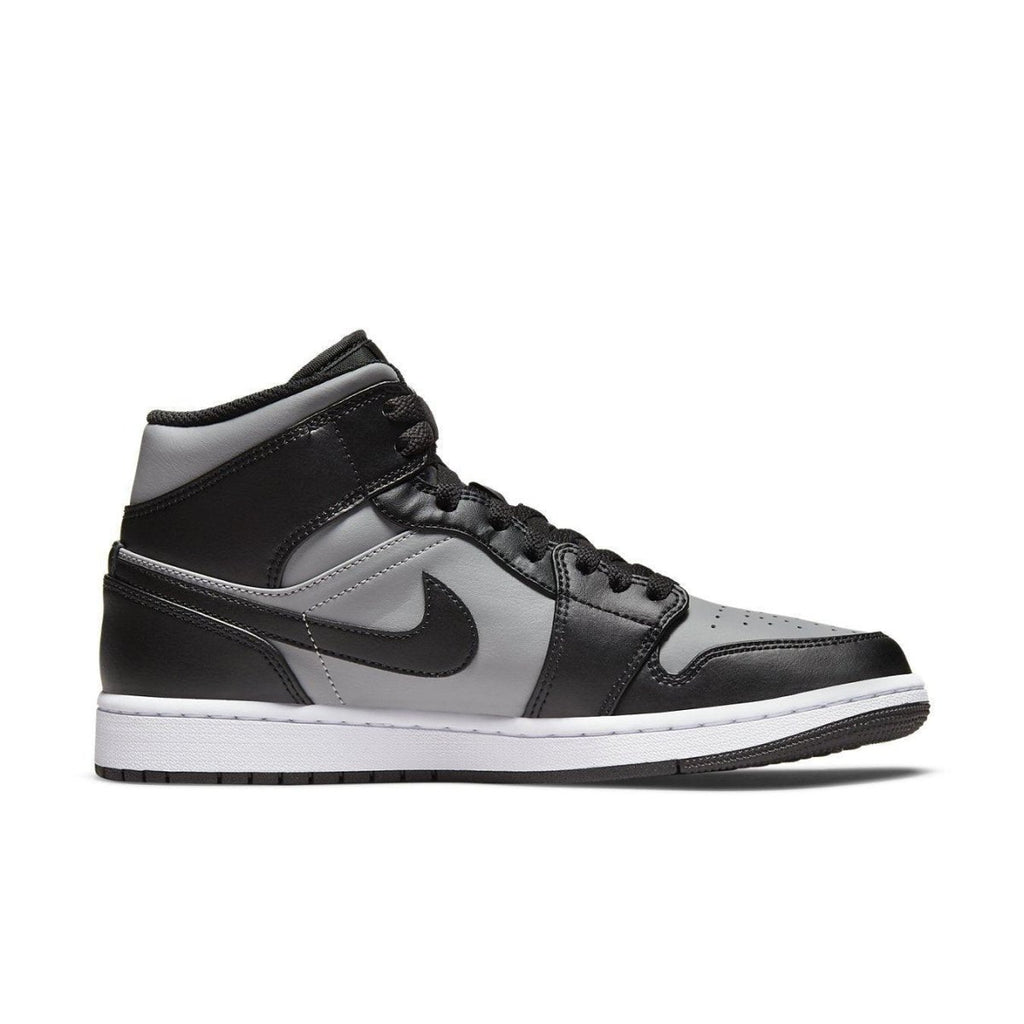Nike Air Jordan 1 Mid Shadow Red sneakers in black and grey with white outsole and Swoosh design.