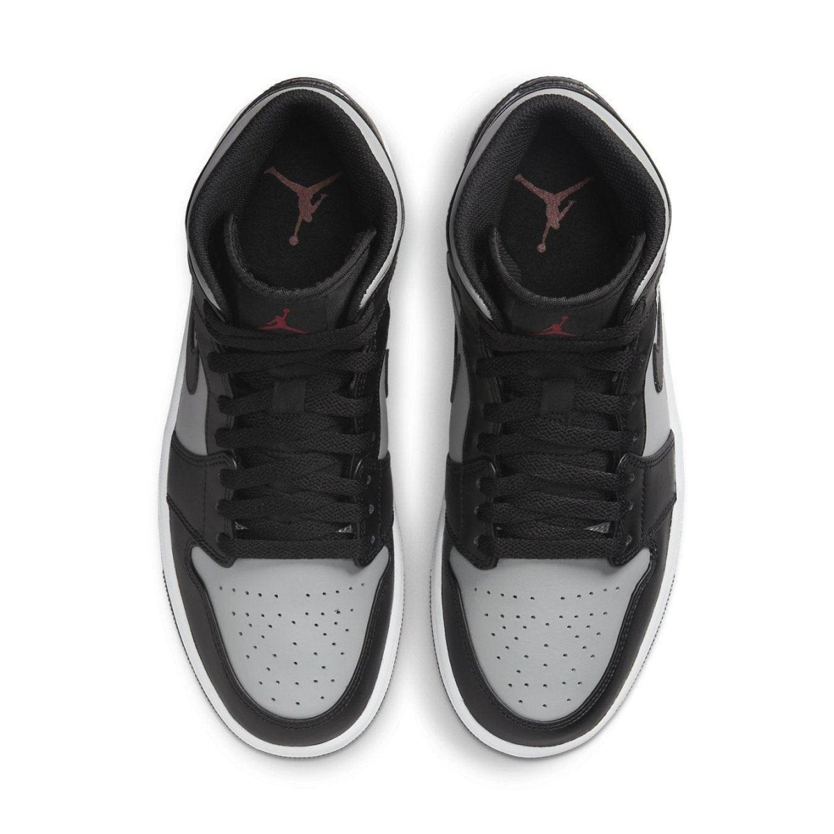 Top view of Air Jordan 1 Mid Shadow Red sneakers featuring gray leather and black accents with red Jumpman logo.