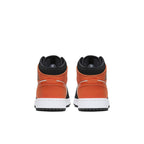 Rear view of Air Jordan 1 Mid Shattered Backboard GS shoes in orange, black, and white.