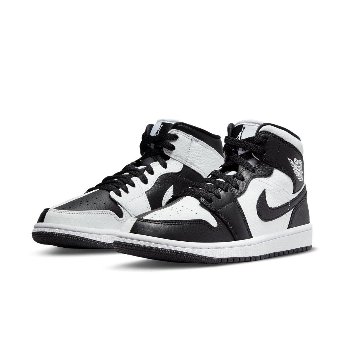 Nike Air Jordan 1 Mid Split Black White for women, featuring black and white leather panels in a stylish design.