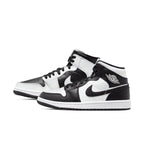 Air Jordan 1 Mid Split Black White Womens sneakers featuring a checkerboard design with leather panels.
