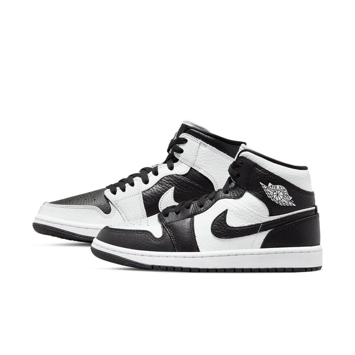 Air Jordan 1 Mid Split Black White Womens sneakers featuring a checkerboard design with leather panels.