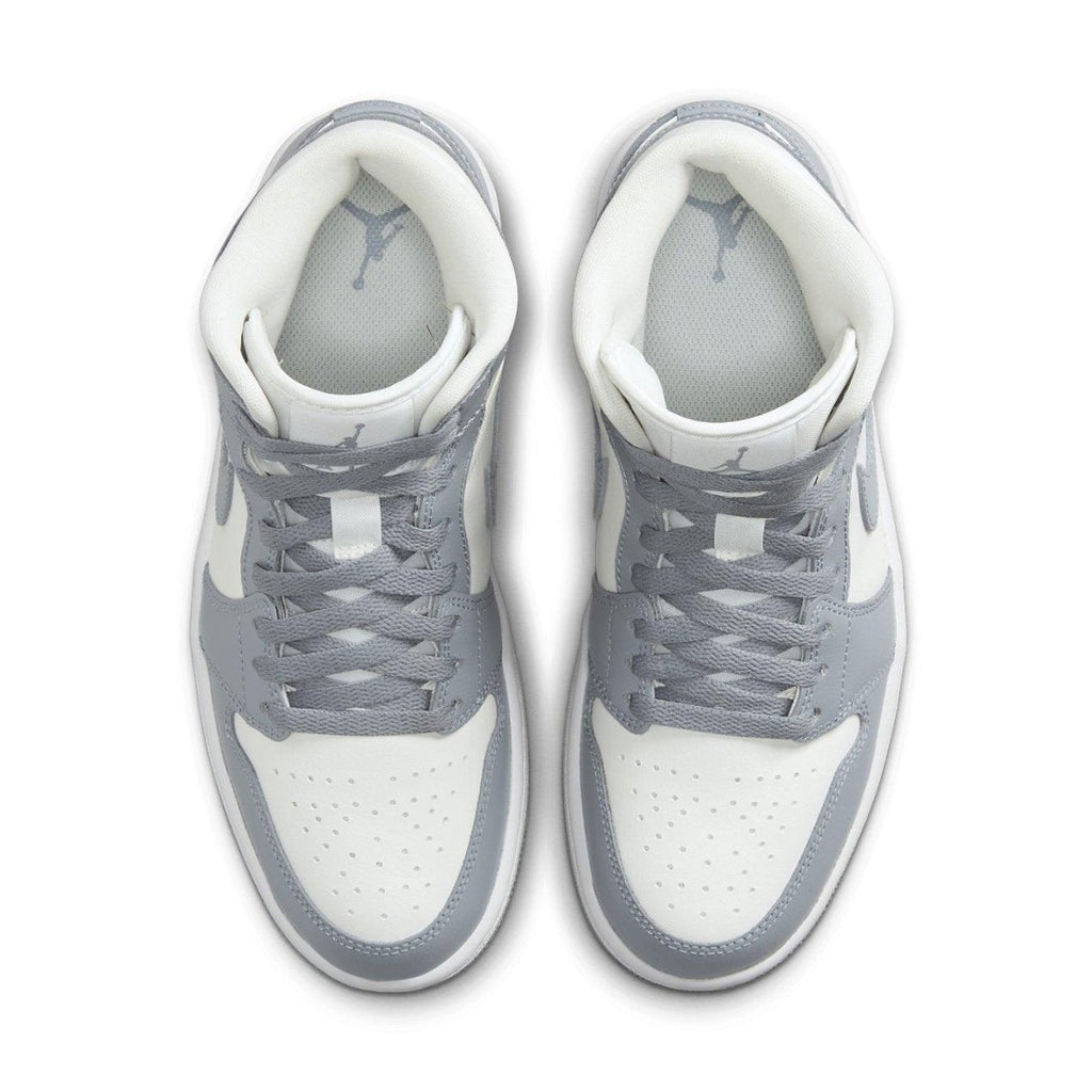 Top view of the Air Jordan 1 Mid Stealth (W) with white and grey color scheme.