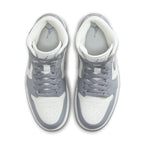 Top view of the Air Jordan 1 Mid Stealth (W) with white and grey color scheme.